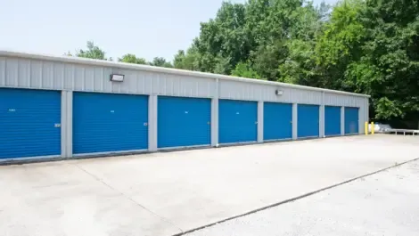 Multiple outdoor storage facility buildings with drive-up units