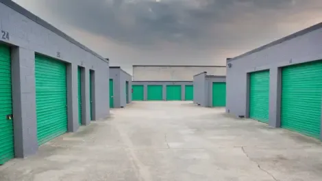 Group of outdoor storage units with drive-up access.