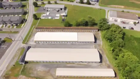 Storage facility exterior with wide drive lanes for trucks