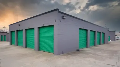 Multiple outdoor storage units with drive-up access and metal roll-up doors