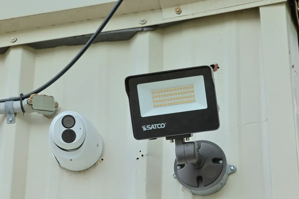 A floodlight on one of the buildings.