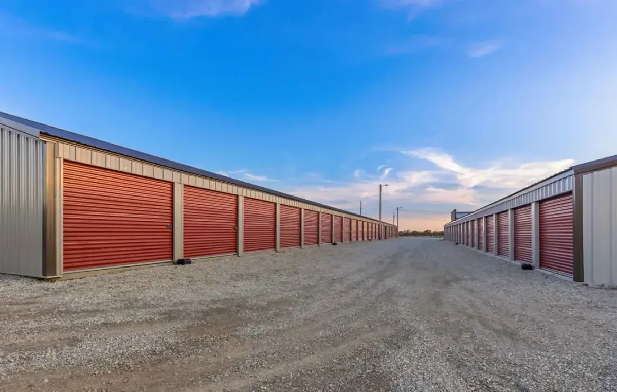 A long row of units with orange doors.