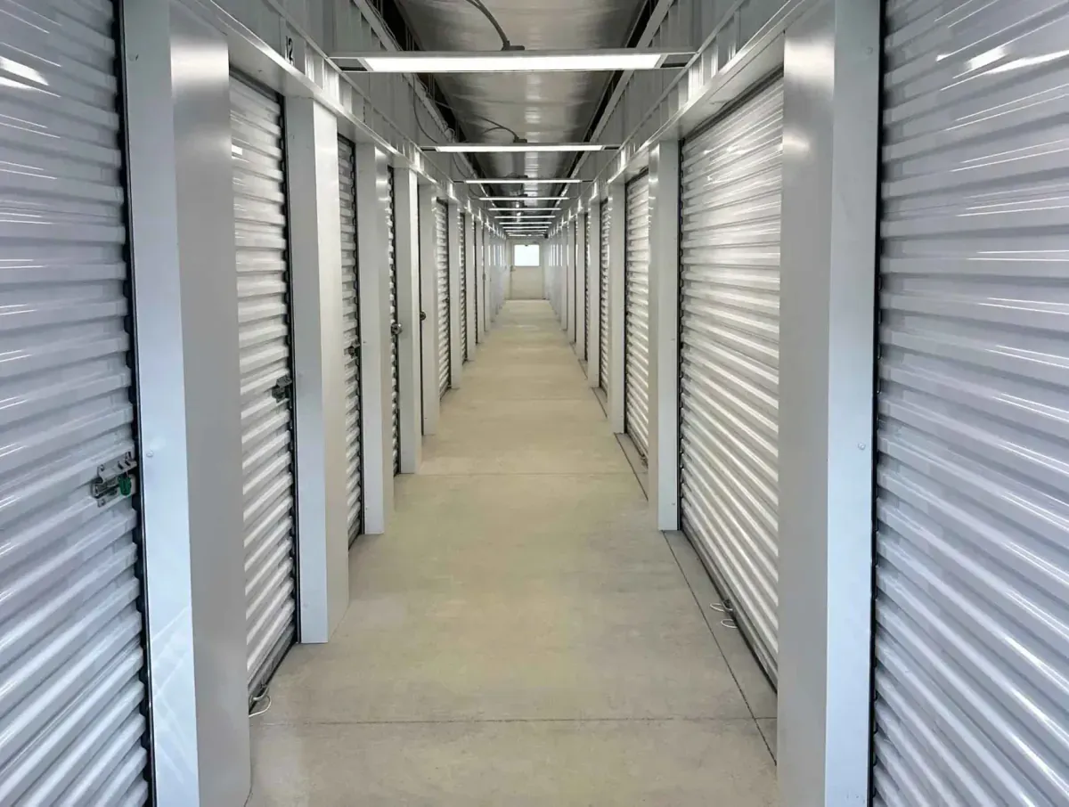 Long interior hallway of storage units.
