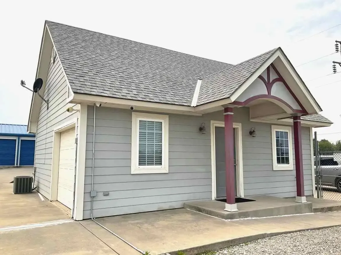 Exterior of a house with grey siding