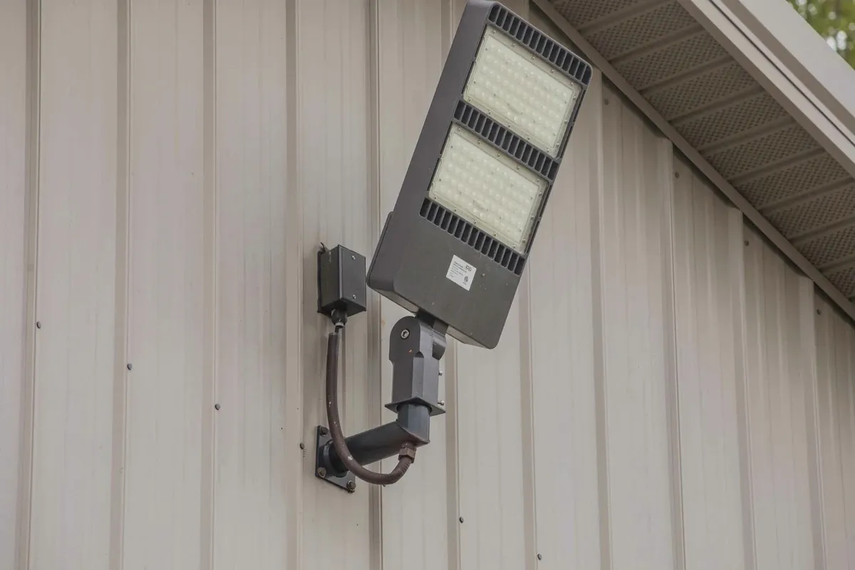 A floodlight on a unit building.