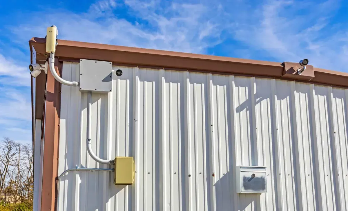 A security camera on a unit building.