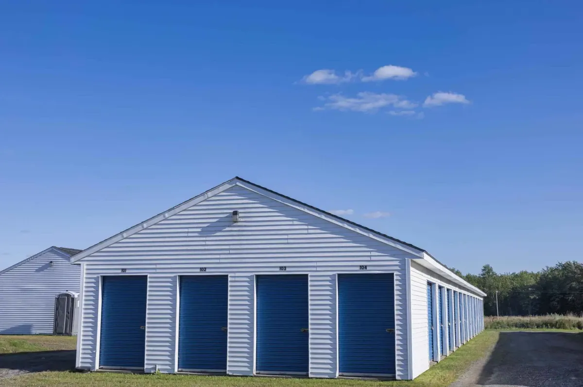 The end of a small storage unit building.