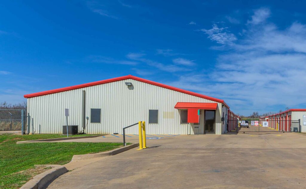 Leasing office and facility gate at KO Storage in Wichita Falls, TX.
