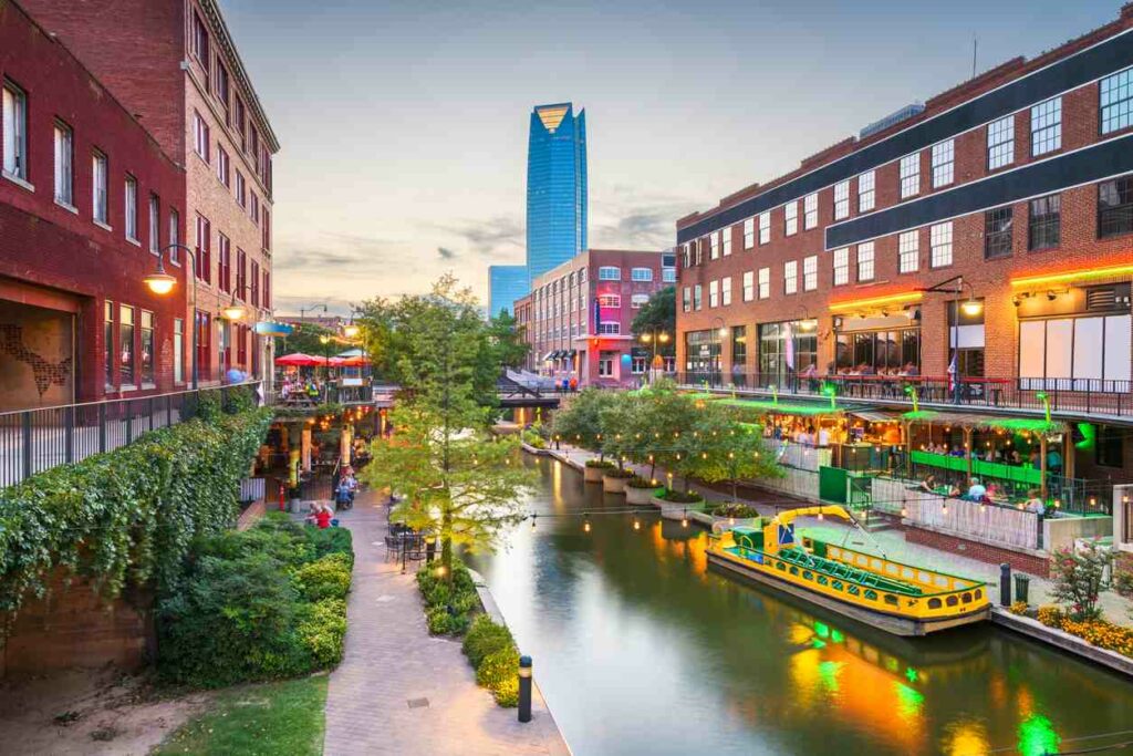 The Bricktown Canal area downtown while lit up and full of patrons at night.