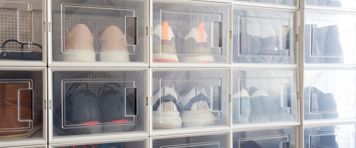 Shoes being stored in their plastic containers